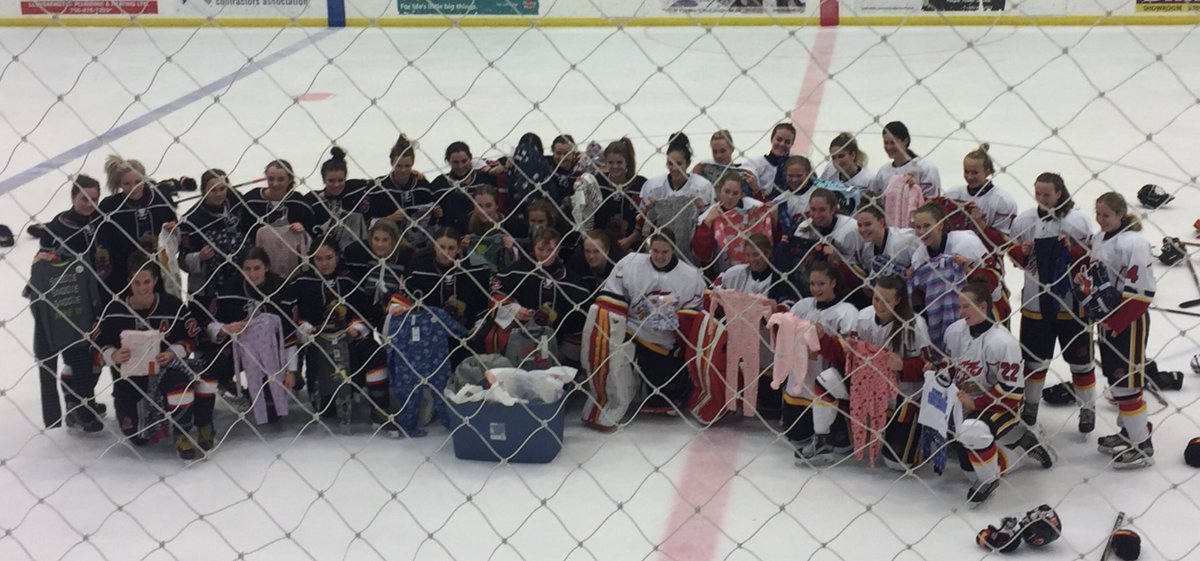 calgaryfireAAA's tweet photo. When teams come together for something thing much bigger than the scoreboard...that’s where the magic happens. So proud! 🔥@StolleryKids are the real winners 💜 thank you @LloydSteelers 
@AFHL_HA https://t.co/UcJ9Fy4gt5