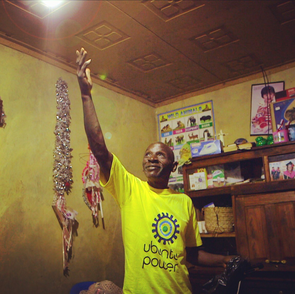 Ubuntu_Power's tweet photo. Our main man Gitonga proudly showing one of our recent #MiniGrid connections #UbuntuPower #SolarPower #Kenya https://t.co/x7hF1ZYDgL
