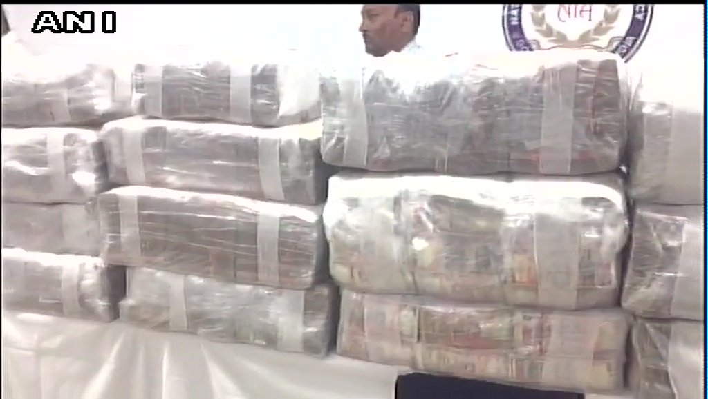 ANI's tweet photo. Delhi: NIA has seized demonetised currency worth Rs 36,34,78,500 and arrested 9 persons in J&amp;K terror funding case. https://t.co/YILYw52t0C