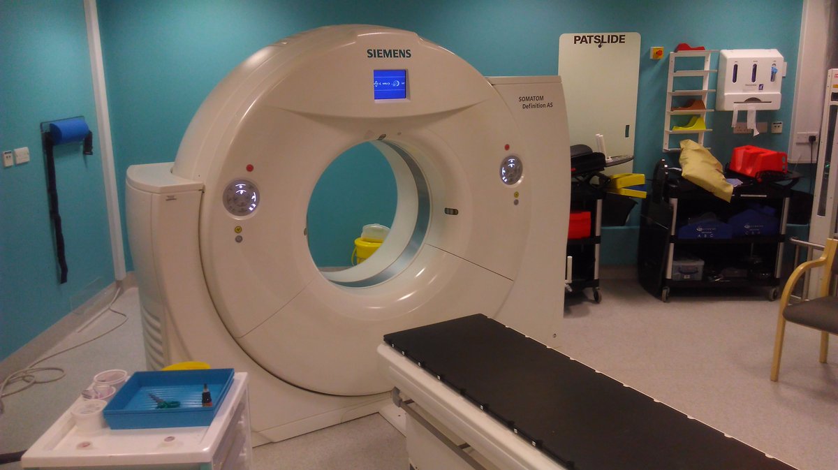 11/This is our CT scanner, used to take X-ray pictures of patients so we can see tumours and design radiotherapy plans to treat them
