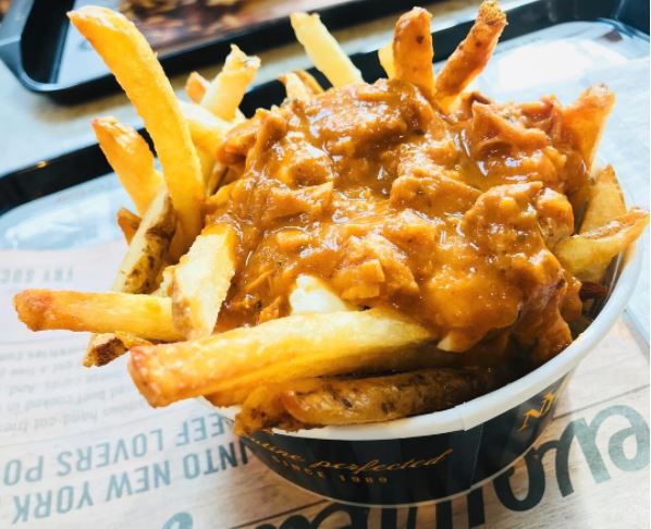 NewYorkFries's tweet photo. Is your chicken buttered? Would you like us to assign someone to butter your chicken? #ButterChickenPoutine (Photo via IG @ yumemusic0321) https://t.co/BtjheEpW8P