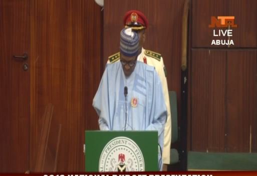 NTANewsNow's tweet photo. #InPhoto; President Buhari presenting #Budget2018 at the National Assembly, watch live via https://t.co/zoY0TqrCtv https://t.co/DKUG280FCd