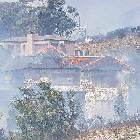 SafeN2Project's tweet photo. A sad sight of the destruction #SirLowrysFire #GBFire #SLPFire has caused so far in #GordonsBay 4 Homes have so far been affected. https://t.co/DAWnvCSXvd