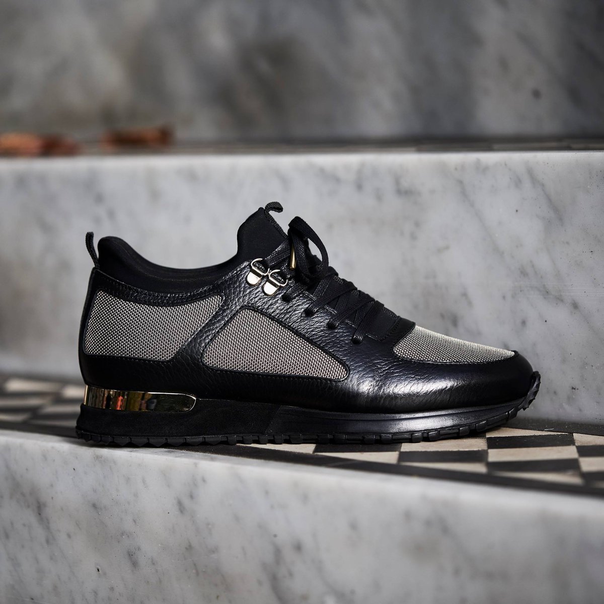 black and gold mallets