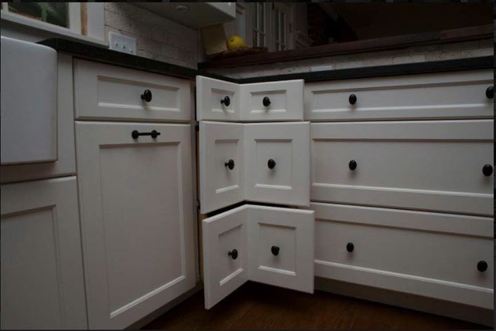 Check out this kitchen with soft-close drawers, corner drawers and custom silverware drawers, all with a dovetail accent.  #woodscabinets