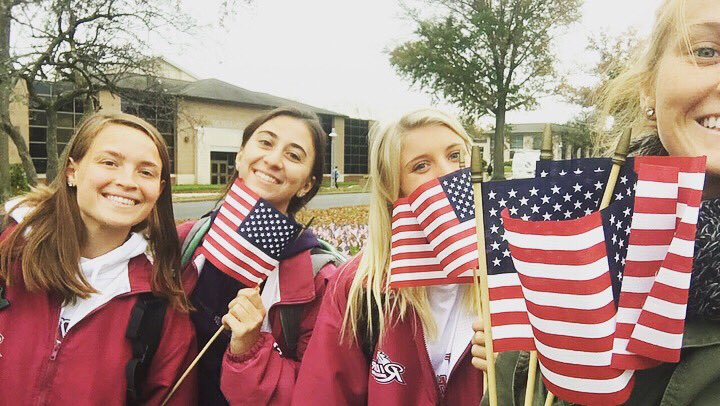 RiderAthletics's tweet photo. Student-athletes & coaches spent time planting flags on the Campus Mall today in honor of #VeteransDay this week. #RiderVets @RiderVeterans https://t.co/0dfTH8g5vW