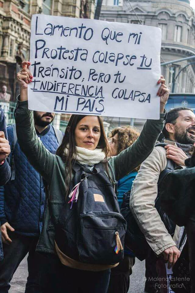 lizcastro's tweet photo. “I'm sorry my protest is collapsing your roads, but your indifference is collapsing my country.”  
#VagaGeneral8N photo:@rodolfgimeno https://t.co/lxY2sVPMO4