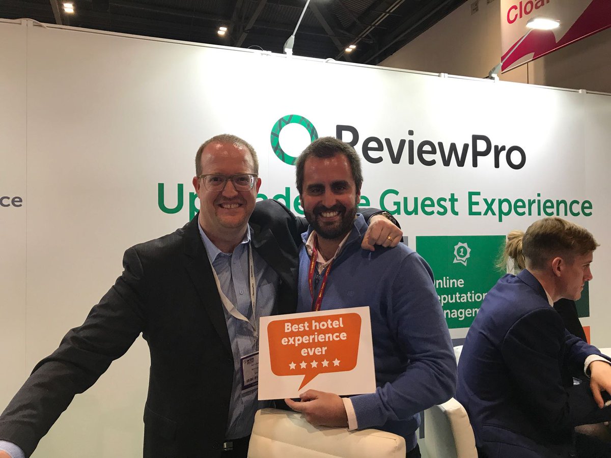 ReviewPro's tweet photo. Yesterday was another busy day at #WTMLDN. Here is our VP of Account Management @NeilAJames with @pablo_dete from @constancehotels. #UpgradeGEX https://t.co/bWKhi9XMsQ