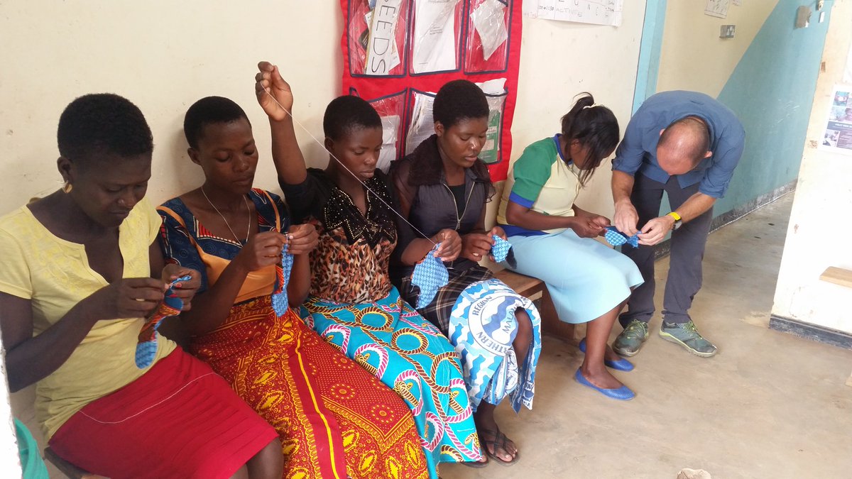 wellsforzoe's tweet photo. Some of the senior girls and #wellsforzoe staff learning how to sow re-usable sanitary towels. On Saturday, they will then show and teach the #girlchildproject students how to make them when the come in for extra school tuition. https://t.co/46T9QtV6cI