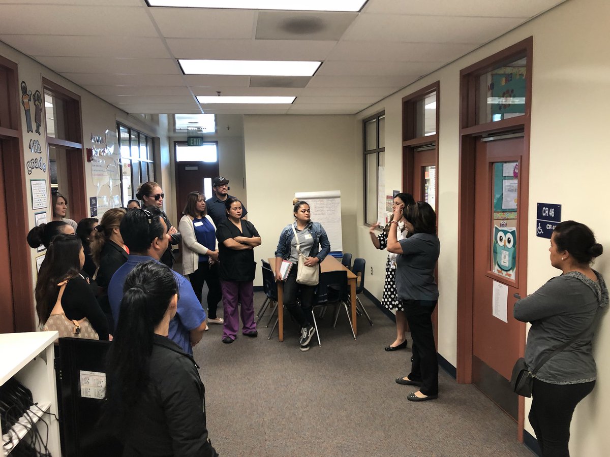 Mann_Elementary's tweet photo. Parents observing and discussing the different academic strategies students use as they visit different classrooms. #ParentLearningWalks @DrCarlosFPerez1 @morganbreazeal @deidra_stewart @AnaheimElem https://t.co/N7vzJ0KvNe