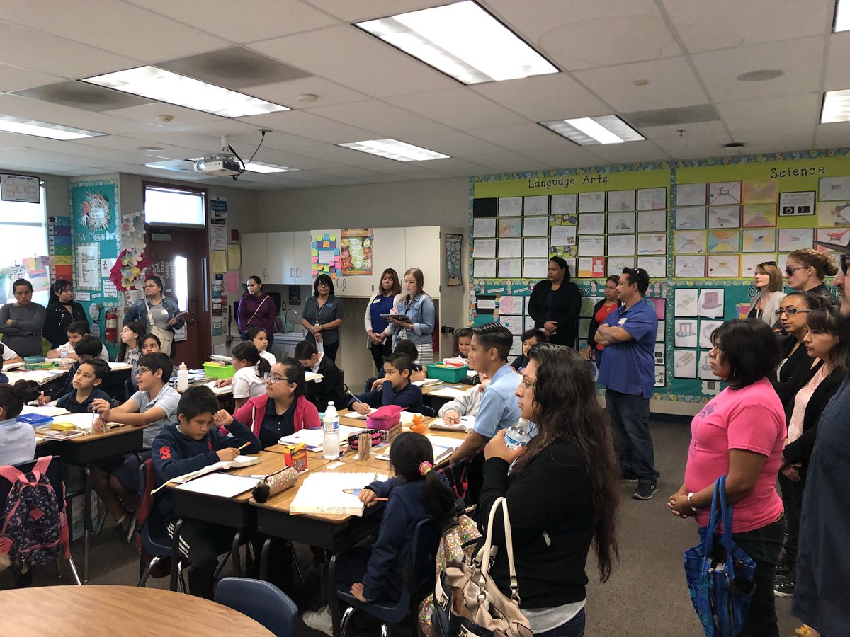 Mann_Elementary's tweet photo. Parents observing and discussing the different academic strategies students use as they visit different classrooms. #ParentLearningWalks @DrCarlosFPerez1 @morganbreazeal @deidra_stewart @AnaheimElem https://t.co/N7vzJ0KvNe