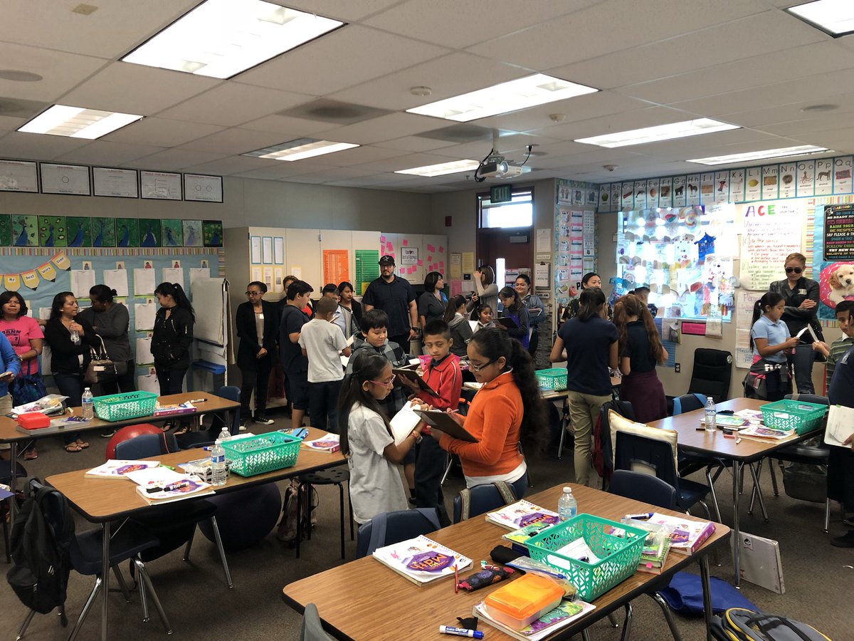 Mann_Elementary's tweet photo. Parents observing and discussing the different academic strategies students use as they visit different classrooms. #ParentLearningWalks @DrCarlosFPerez1 @morganbreazeal @deidra_stewart @AnaheimElem https://t.co/N7vzJ0KvNe