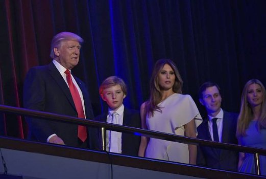 (30) The Trump family appear on the balcony.