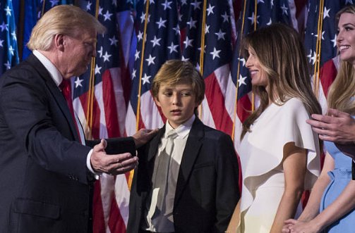 (35) Both parents smiling, probably because their exhausted boy was too overcome to respond when invited to do the next thing.