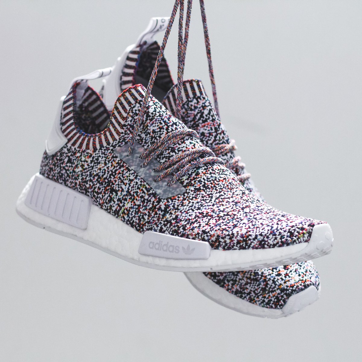 KicksDealsCA's tweet photo. Here's a great look at this weekend's NMD R1 Primeknit "Colour Static" ($250) release via @solestop. Preview: https://t.co/47ScBucTqC https://t.co/ft19JD9PSt