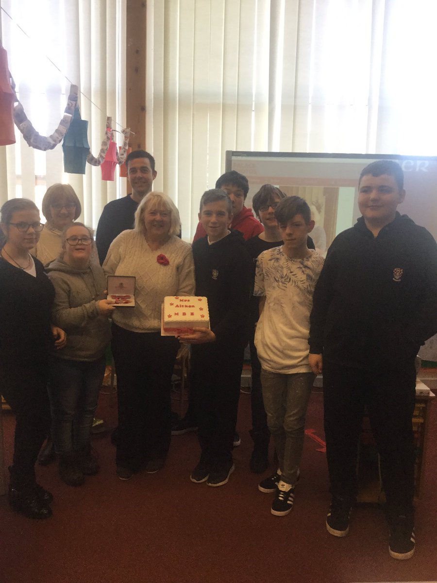 Celebrating Mrs Aitken's MBE! We are all very proud!