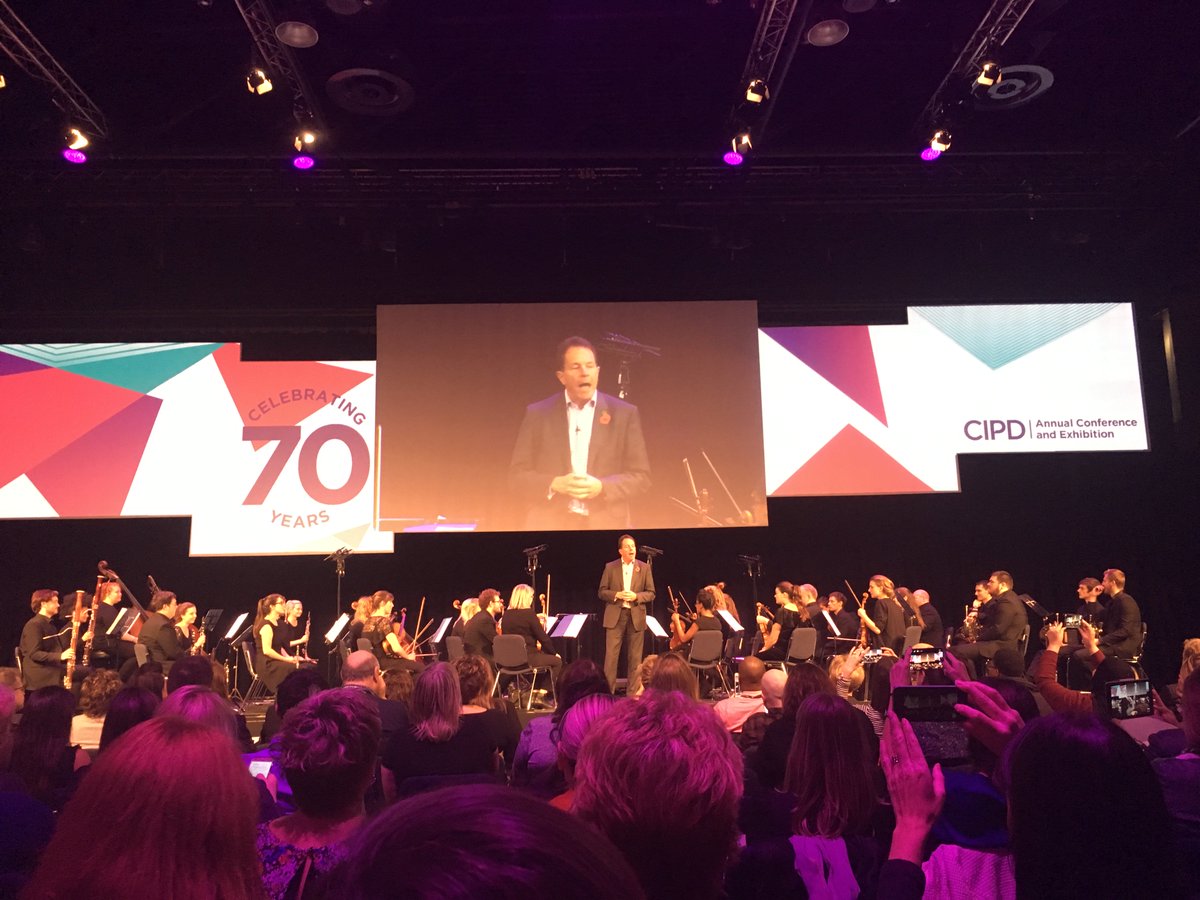 AlexSmithiesHR's tweet photo. Closing Keynote sung by Peter Cheese @SarahCl10161511 #cipdACE17 https://t.co/dcvQfaIdnr