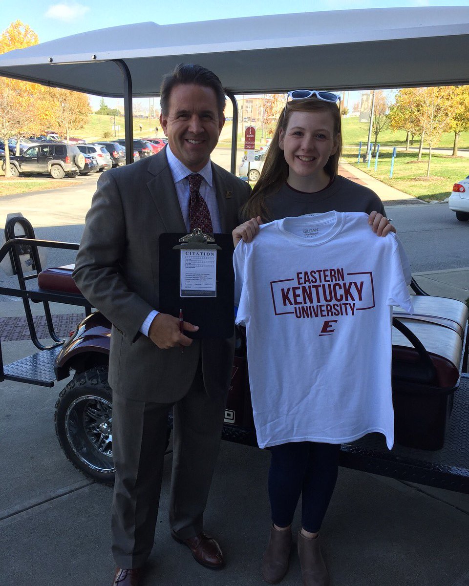 EKU_SGA's tweet photo. Everyone better watch out! President Benson and Student Body President, Laura Jackson, are out issuing citations and swapping shirts to students wearing other school attire! Make sure you are showing your Colonel pride by wearing your EKU apparel! https://t.co/22wJ5va1hW