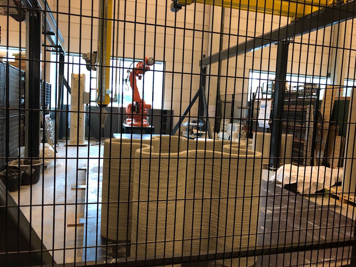 GINCADesign's tweet photo. The Concrete Additive Manufacturing lab of TU/e. So interesting to see the heights that 3D printing is scaling! #3Dprinting #AdditiveManufacturing https://t.co/9VUyj067sF