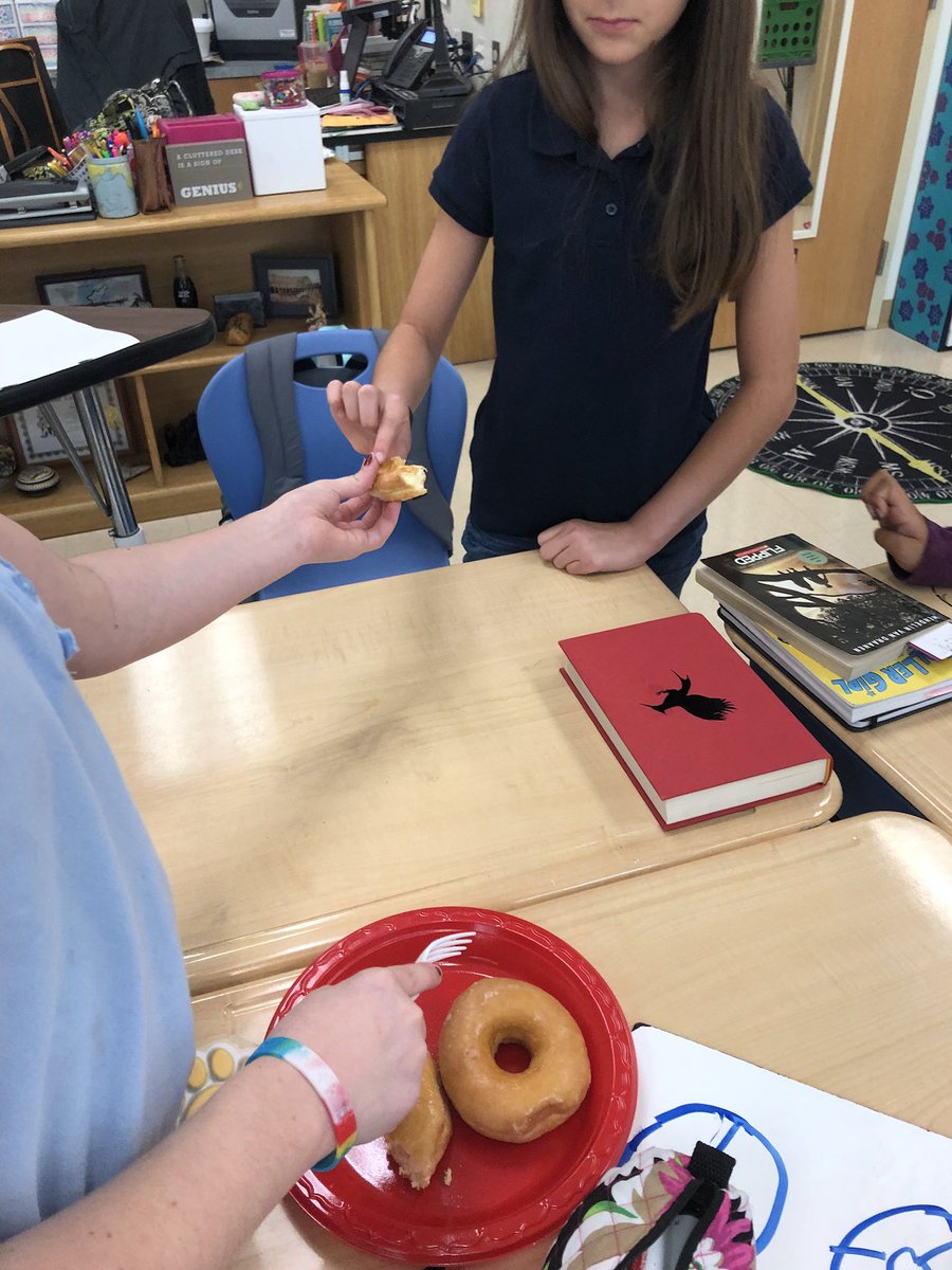 JulieReheiser's tweet photo. Talk about motivation. Using donuts as manipulative for relating fractions and division. @CESWildcats #donutmath #VCSMath https://t.co/svg5oJJZUd
