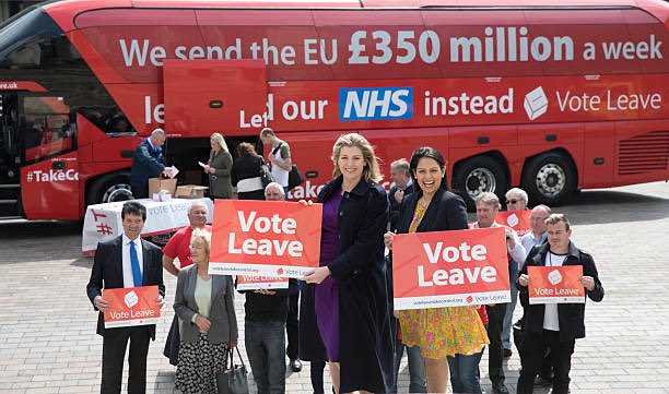 ChukaUmunna's tweet photo. Is that Penny Mordaunt I see standing next to Priti Patel promising to ensure £350m extra per week goes to the NHS? We look forward to seeing her use her new cabinet post to make it happen. https://t.co/eZH1PoJIBk