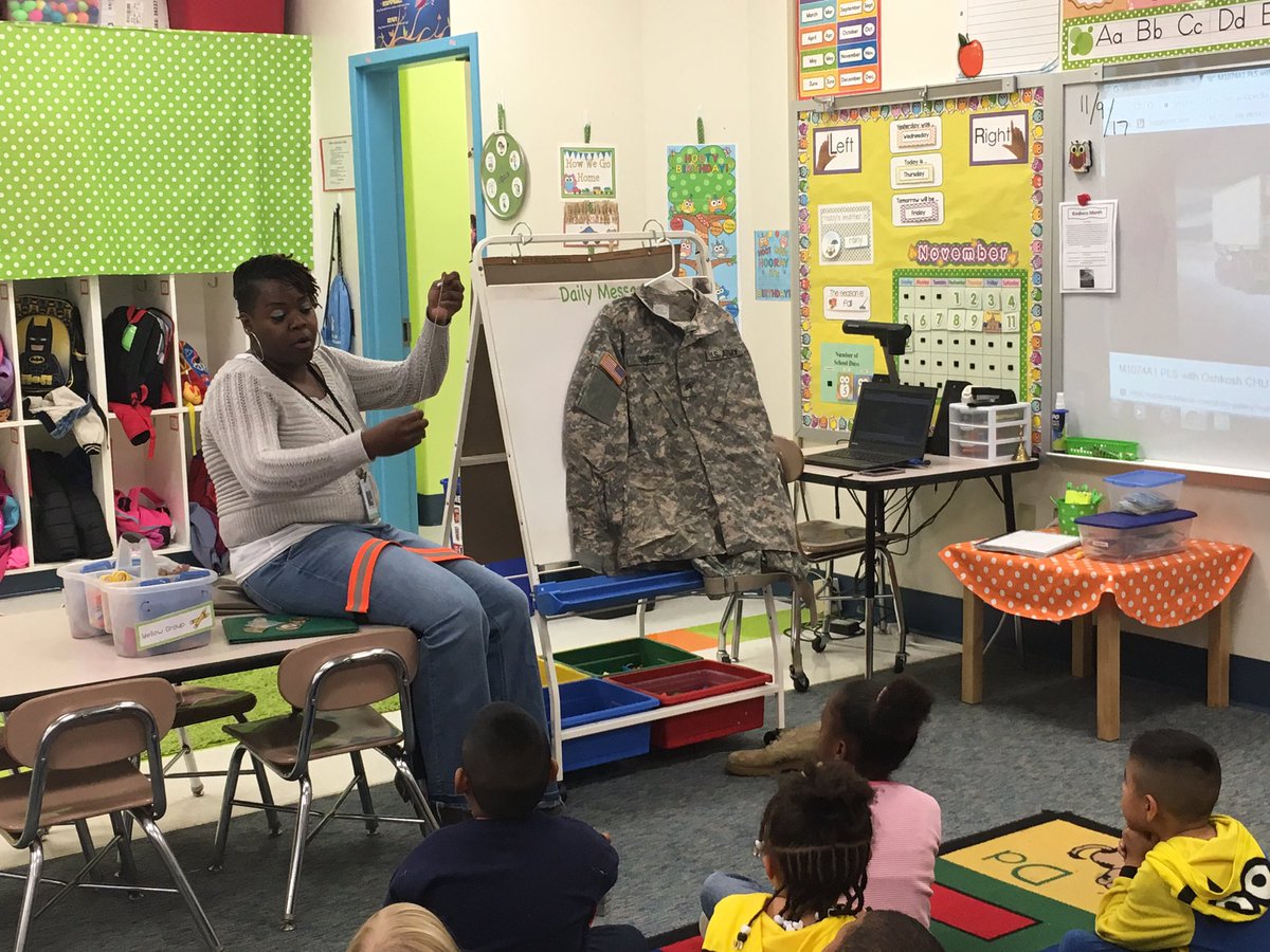 Aversboro_K's tweet photo. Teacher Assistant, Mrs. Paula Tripp, sharing with a kindergarten class about her Army service. Thank you to Mrs. Tripp and all veterans. 🇺🇸 https://t.co/SBPmO8OOIQ