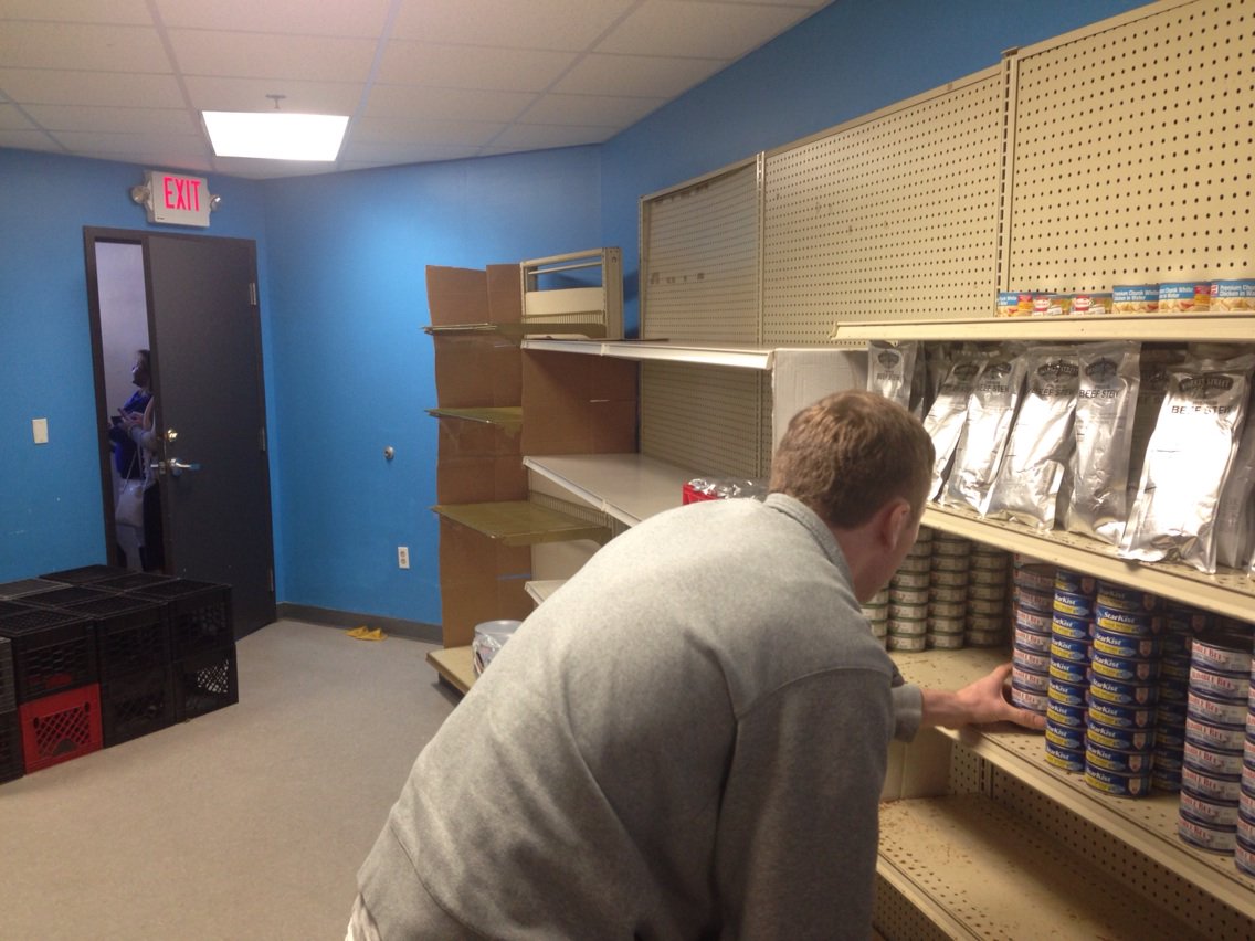 PaulWBZ's tweet photo. Lazarus House, frantically re stocking shelves after serving 950 families Now nonprofit needs help #wbz https://t.co/8Z34meXBXR