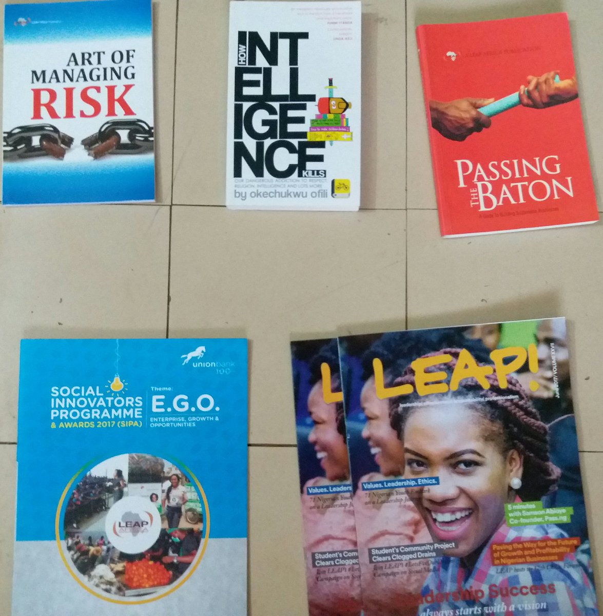 Chiege_U's tweet photo. One of the highlights of my day. New acquisitions from @LEAPAfrica And @ofilispeaks #leapsipa2017 https://t.co/O36ckSUNAN