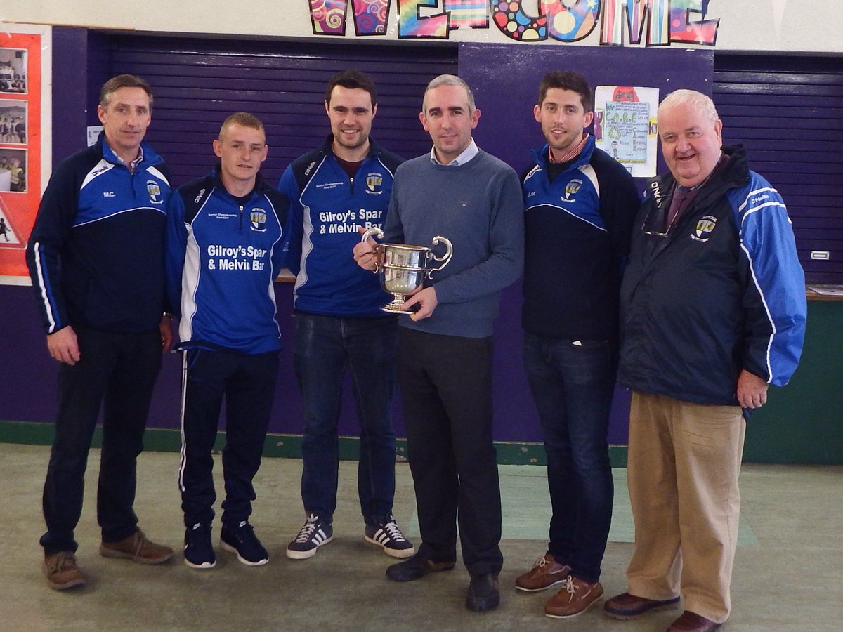 StMartinsPS's tweet photo. Some of the @DevenishGAA Senior Men's team visited yesterday with the Division 1 League Cup. Thanks to Terry, Martin, Eoghan, Malachy and Peter for sharing their success with us. A great achievement in Centenary year. #Devenish100 https://t.co/ZkY3AuwtCJ