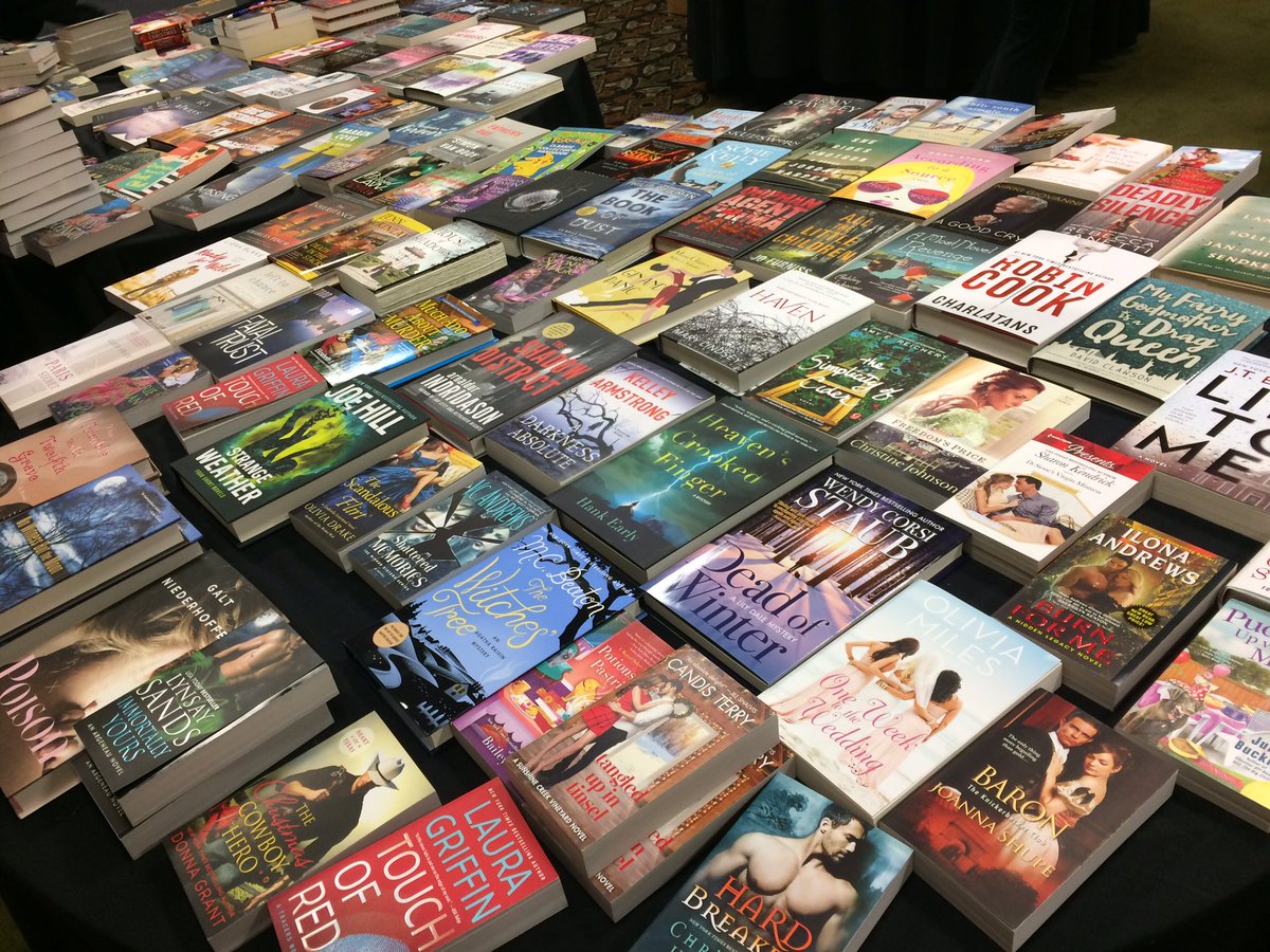 pcsalcedo's tweet photo. Sorting ALL the books for Readers &amp; 'ritas raffle baskets. @FreshFiction does it right. #drool #FFRNR https://t.co/YEvc6BEyPN