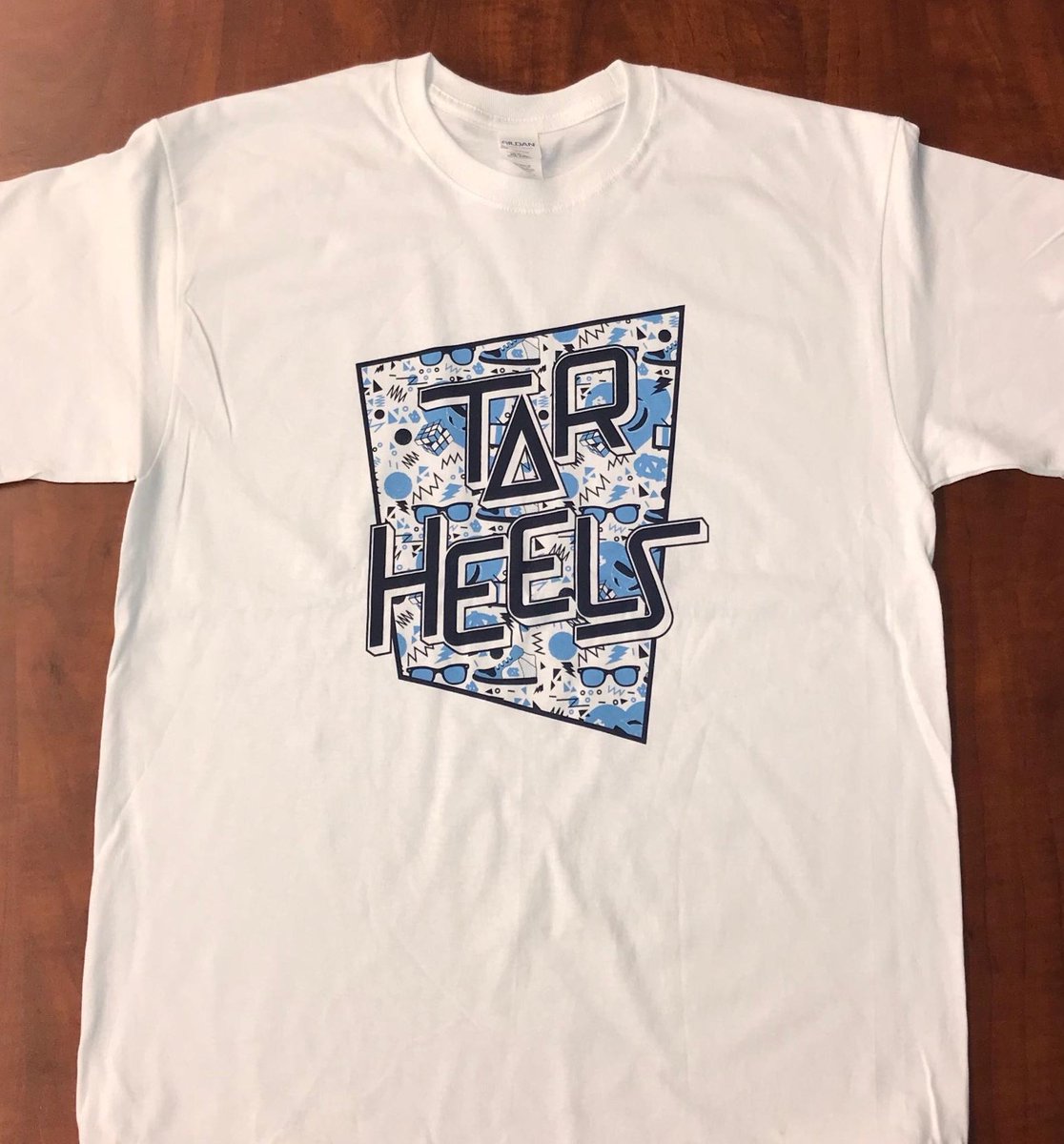 UNCVolleyball's tweet photo. Don't miss 80s Night tonight at 6:30! First 150 @carolinafever members get these tubular t-shirts! @UNC_BlockParty #goheels #ThrowbackThursday https://t.co/DfGPcnDtjq
