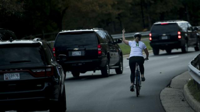 thehill's tweet photo. Crowdfunding campaign raises over $30k for woman fired for flipping off Trump motorcade https://t.co/cdm4HLyat8 https://t.co/82JaXgj8GW