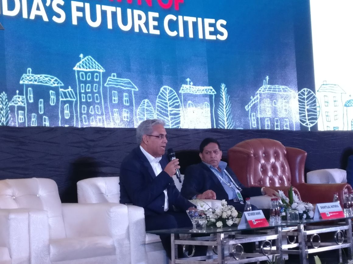 CREDAINational's tweet photo. Every developer is a risk taker. I have always worked towards building an organization and now we have 3,800 people out of which 80% have their own homes: Getamber Anand, our Chairman at the #NewIndiaSummit https://t.co/cweElb1FyV