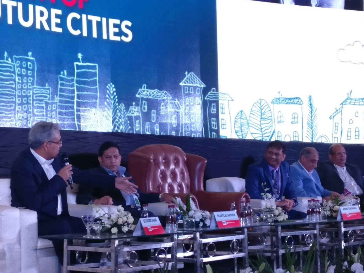 CREDAINational's tweet photo. Every developer is a risk taker. I have always worked towards building an organization and now we have 3,800 people out of which 80% have their own homes: Getamber Anand, our Chairman at the #NewIndiaSummit https://t.co/cweElb1FyV