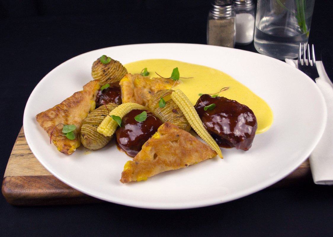 maxsglasgow's tweet photo. On specials board this week - BBQ glazed pig cheeks served with Cajun hasselbacks, baby corn, sweet corn veloute, jalapeno &amp; red pepper salsa and corn fritters. https://t.co/MPkbOoFpiI