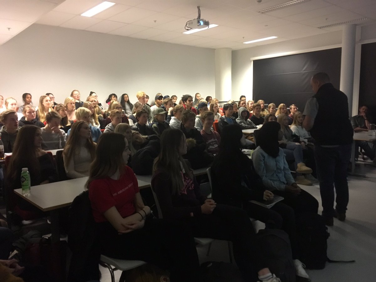 HelenNiMhuiri's tweet photo. Shawn teaches Norwegian teens about Australian Indigenous culture. The auditorium is packed out! #indigicate https://t.co/7aJJRkj8sR
