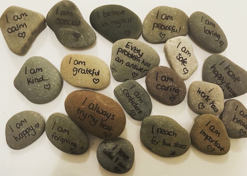 helloyogaplay's tweet photo. Miss Laura and Penny picked some pebbles during the summer and created these wonderful positive affirmations #promotingpositivity #LYA https://t.co/IopNL2WczQ
