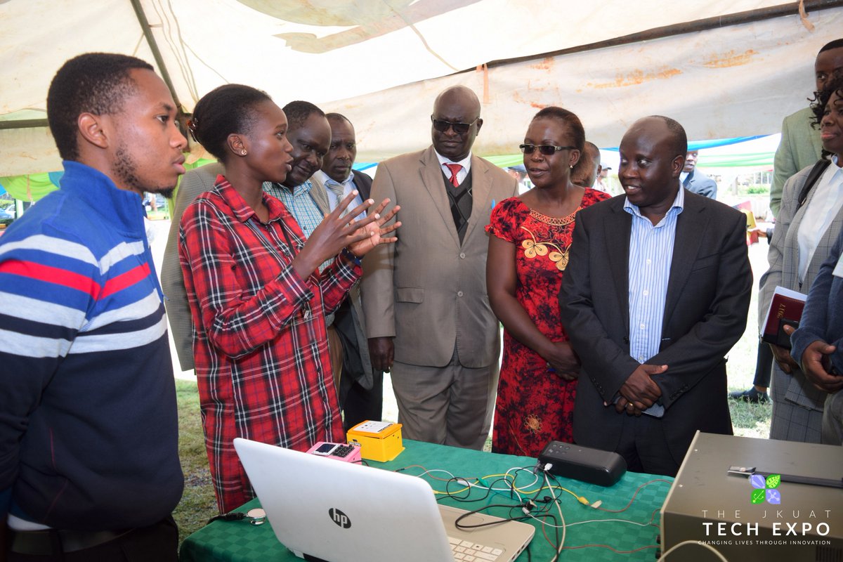 jkuattechexpo's tweet photo. Members of the JKUAT University Council  keenly listening to Lisa , a participant of  the #heartbeat project, explain how to works. #Expo8 https://t.co/Z1oZZUqrBi