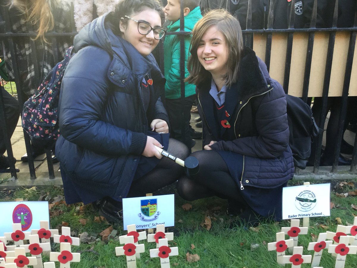 conyers_sl's tweet photo. Student Leaders Lilia Durrani and Fenella Coleman lay down a poppy wreath and poppy crosses at a Stockton Remembrance Service. https://t.co/80I35FIXpP