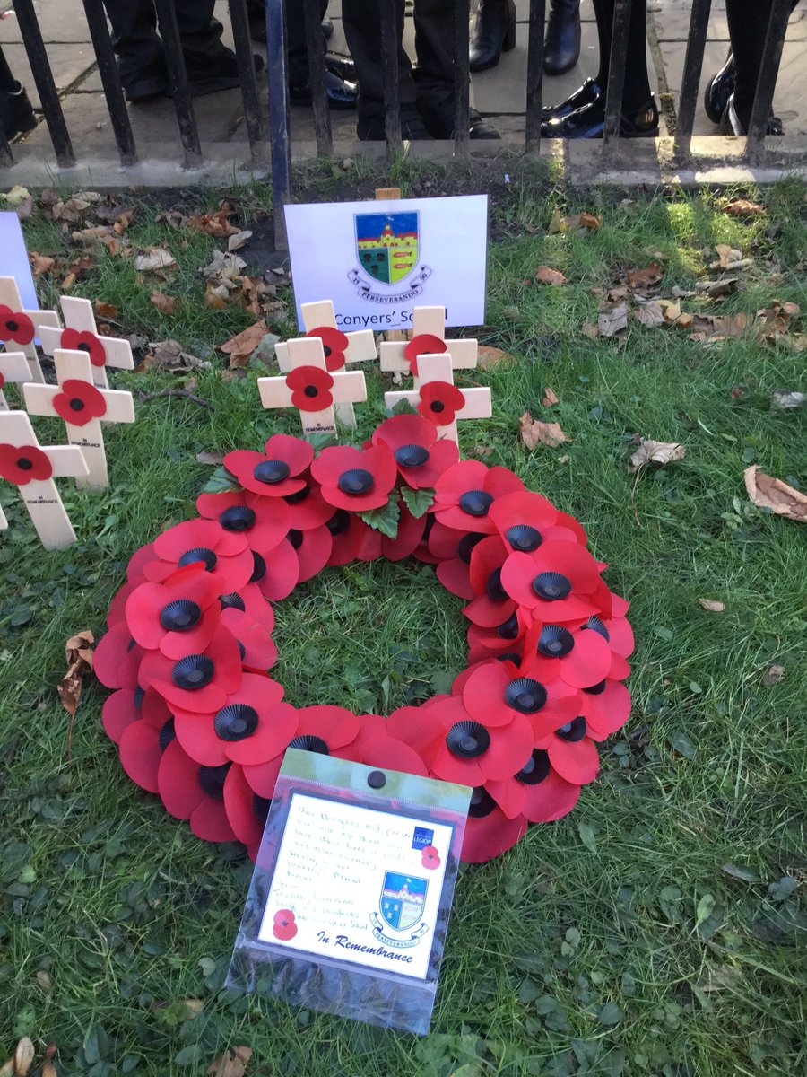 conyers_sl's tweet photo. Student Leaders Lilia Durrani and Fenella Coleman lay down a poppy wreath and poppy crosses at a Stockton Remembrance Service. https://t.co/80I35FIXpP