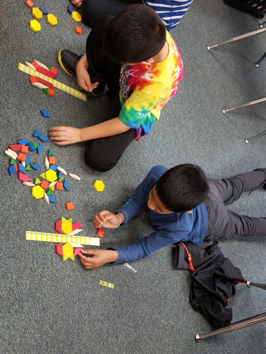 TeacherGant's tweet photo. More fun with symmetry. #mathisfun #funingrade2 @colinpowelles https://t.co/5aQ5o3Yrgx