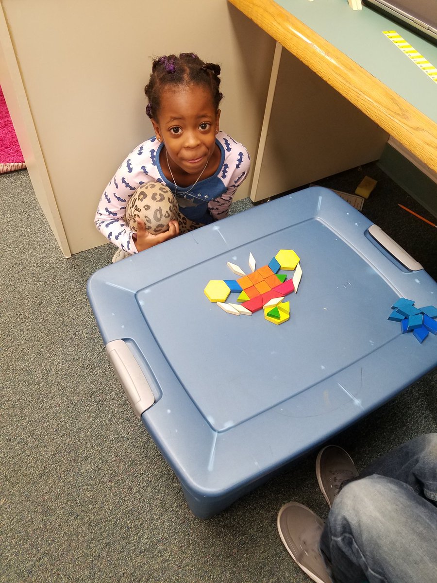 TeacherGant's tweet photo. Building symmetrical pictures with pattern blocks. #mathisfun #funingrade2 @colinpowelles https://t.co/rjDpbt6YaO