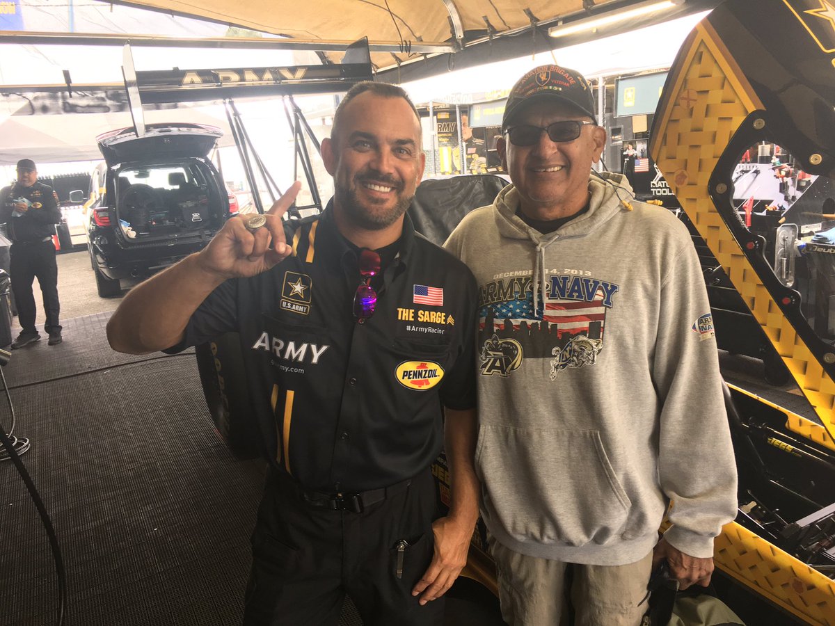 TheSargeTF1's tweet photo. We have a winner! John Solis from Glendora, CA was the first veteran to come by and claim the #RideALong in the #ArmyRacing tow vehicle for today's #NHRAFinals Q1 session! John is a veteran of Vietnam 1969-70! #Hooah @NHRA https://t.co/NhnnIgqk2U