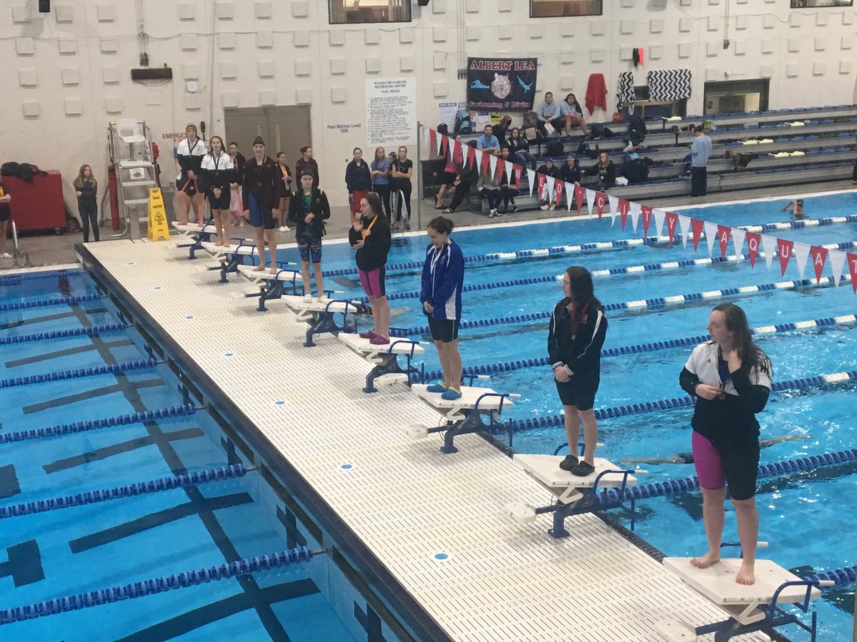 Megan Gehrke wins the 100 Free with a time of 53.69, defending her title and punches her ticket to State! Malia Stone finishes in 7th at 56.61; Ahnika Vininski places 8th at 57.09! Three Falcons on the podium! Great job!