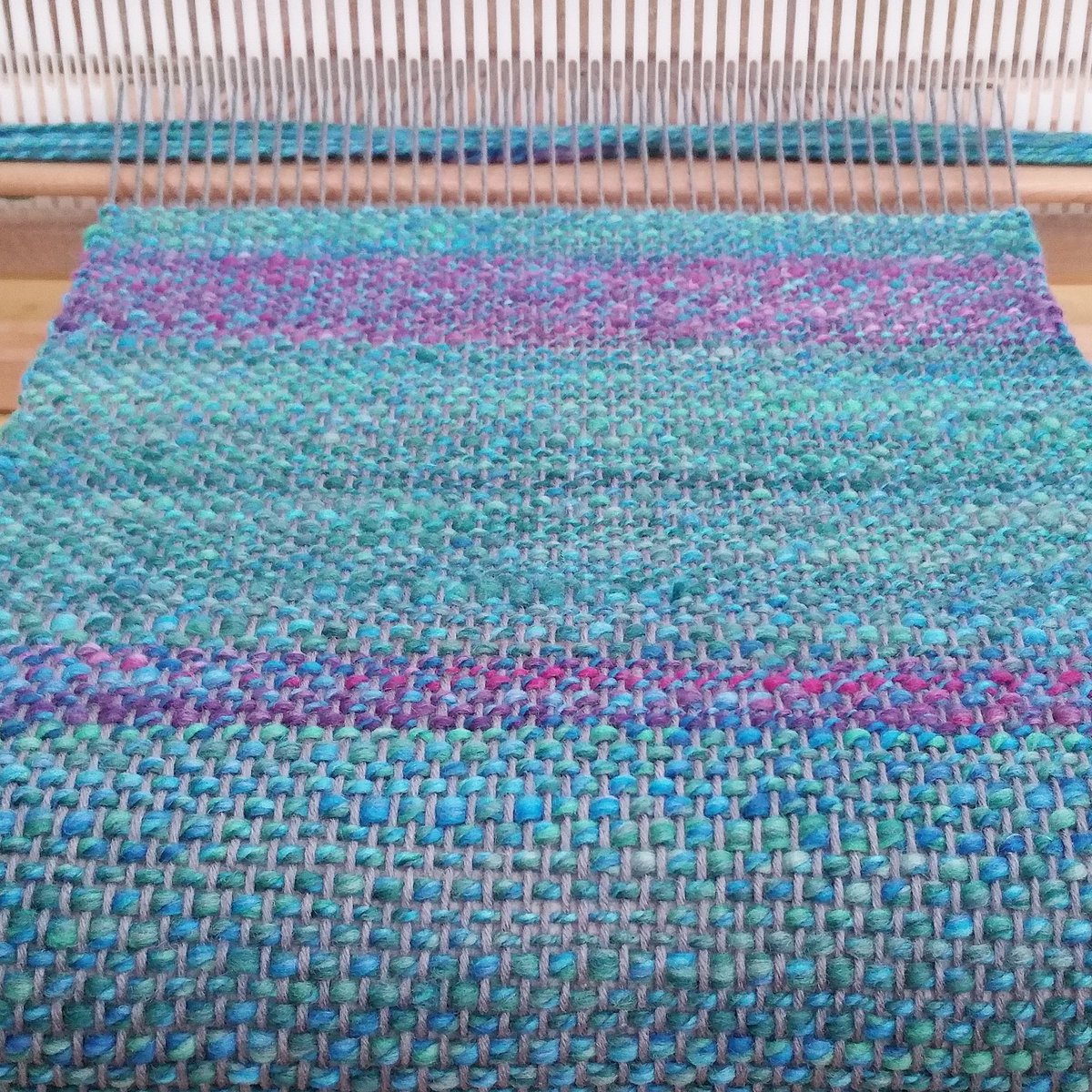 seasheepshe's tweet photo. Chanelling my inner mermaid whilst weaving with reclaimed and sustainable yarns. #handspun #weaving #scarf #Recycle https://t.co/XiuQjW5lHL