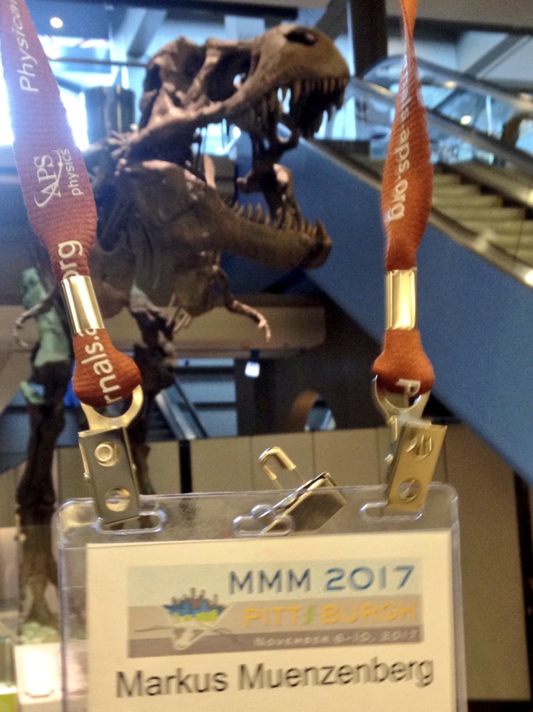 spintronicsHGW's tweet photo. Propably the cutest badge I ever had! T Rex escaped from Carnegie museum to airport, likes classic music, featuring Wagner. Leaving #MMM62 https://t.co/f8bFId7jIT
