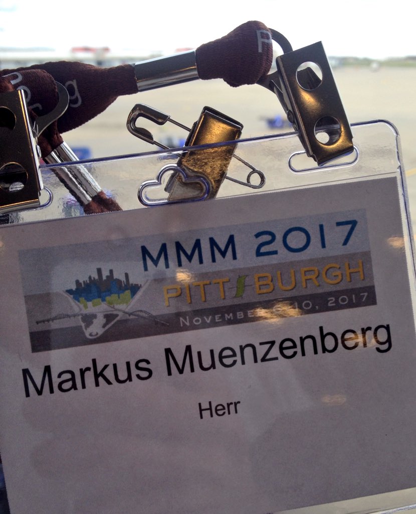 spintronicsHGW's tweet photo. Propably the cutest badge I ever had! T Rex escaped from Carnegie museum to airport, likes classic music, featuring Wagner. Leaving #MMM62 https://t.co/f8bFId7jIT