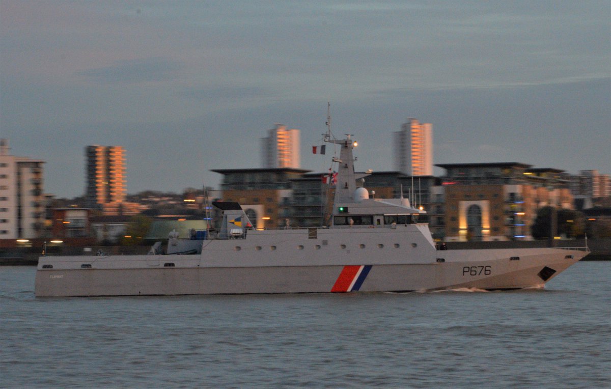 AJBC_1's tweet photo. At the going down of the sun @MarineNationale #OPV #FSFlamant arrives on the #Thames #London heading to @CRTLondon #WestIndiaDock for #Remberance weekend @LondonPortAuth #dlr_blog https://t.co/Dlg5o2ek6T
