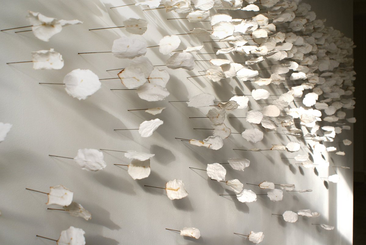 Arthouse1London's tweet photo. Caught in the morning light - 'Accumulate' by @janeponsford Thousands of fragments of paper cast onto pins. 
Breath taking. And if you look real close you can just see traces from @susanefrancis and @fiona_grady recent works on this same wall. https://t.co/EW3mGMVdYo