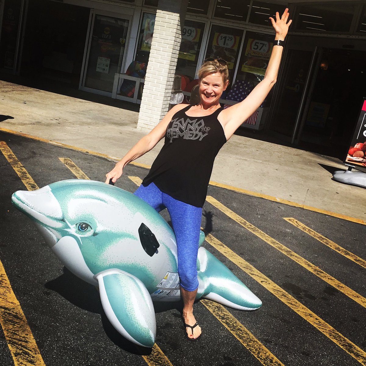 Here's our friend Anne Marie rocking a MLRx tank while riding the elusive parking lot porpoise of Panama City Beach.